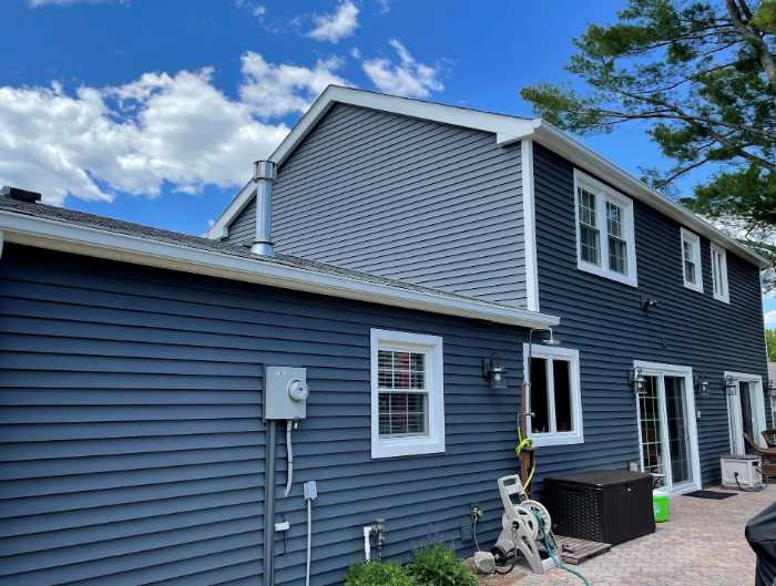 Blue vinyl siding on a house