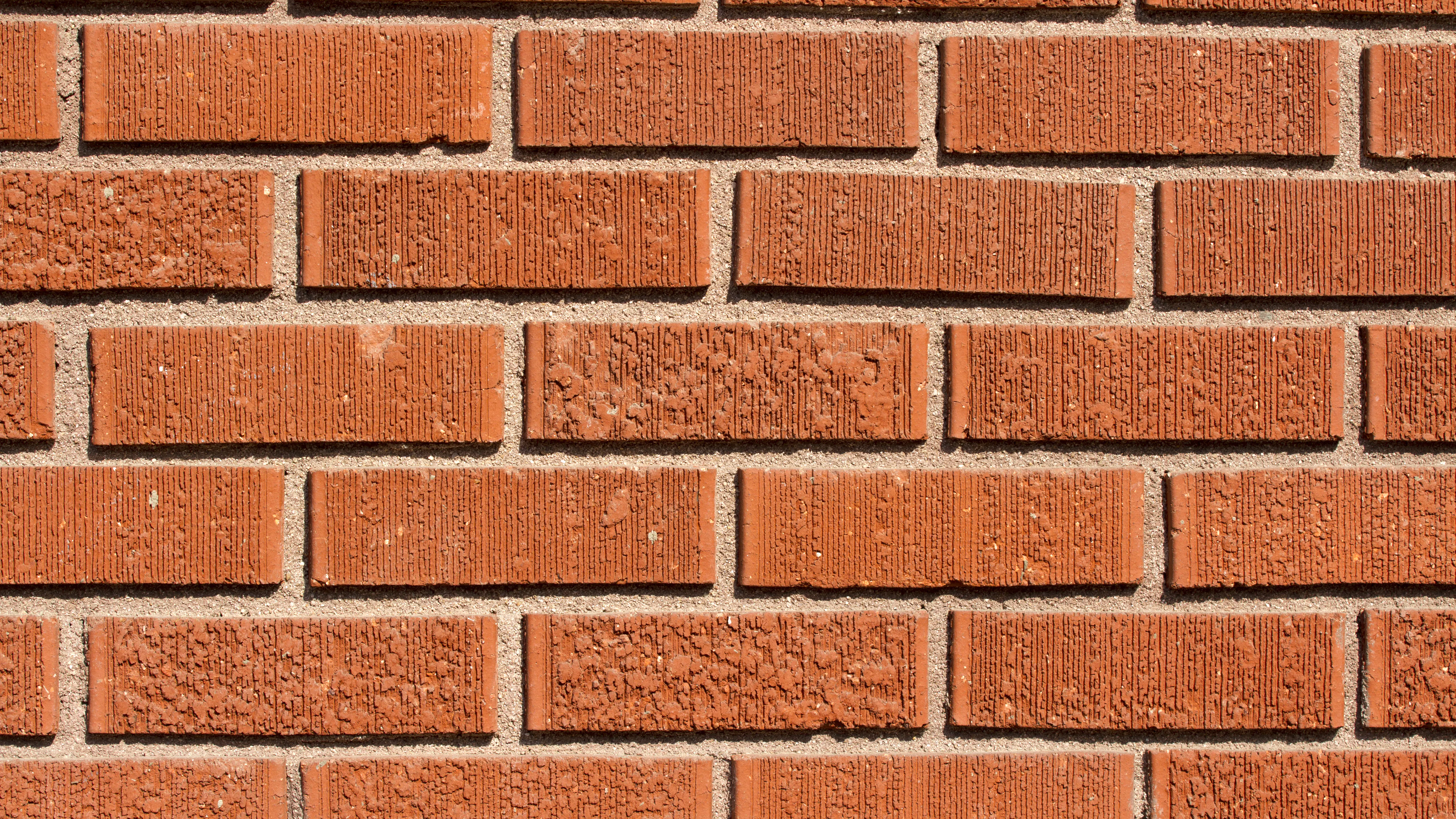 A close up of brick siding