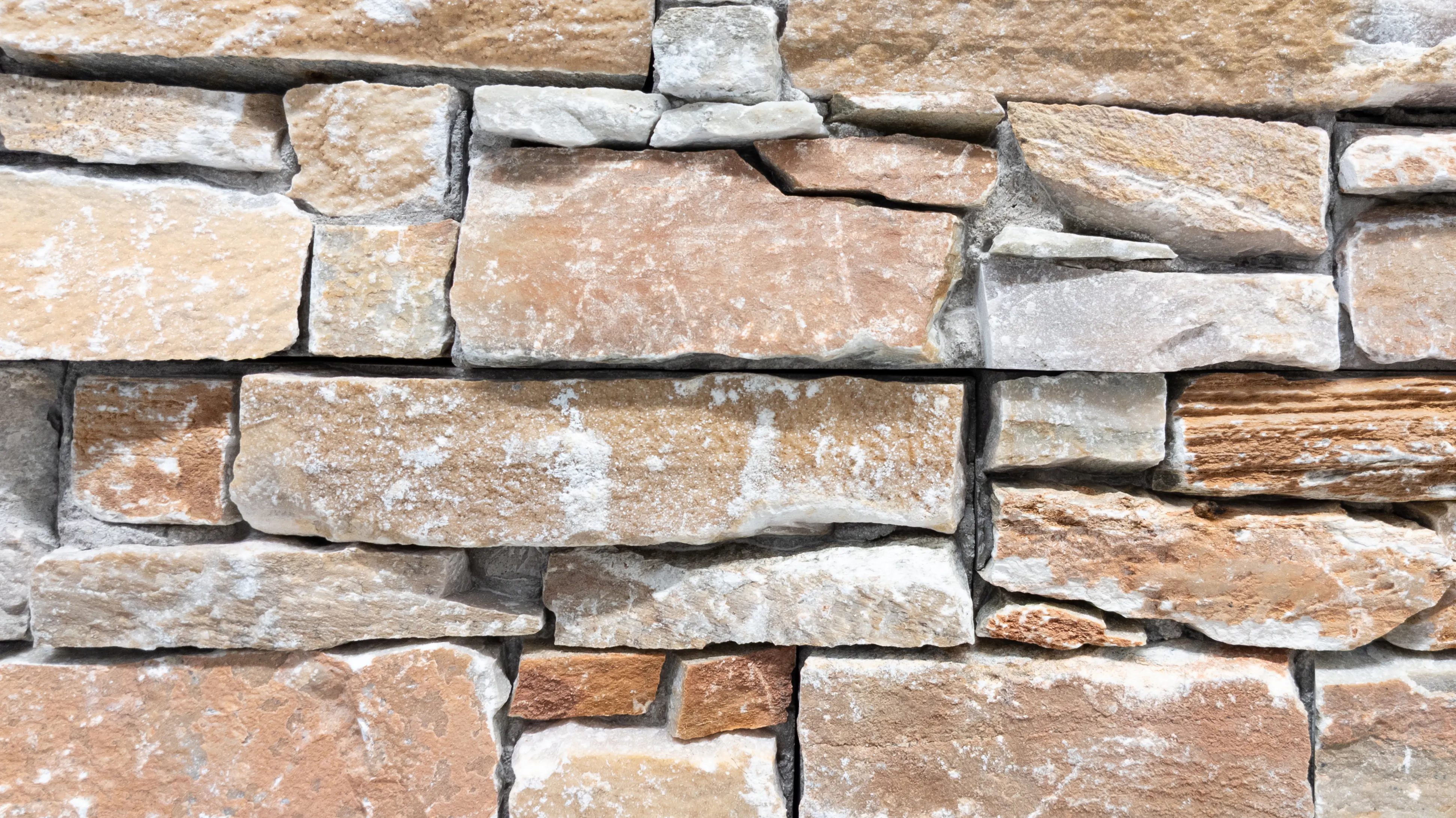 A close up of stone siding