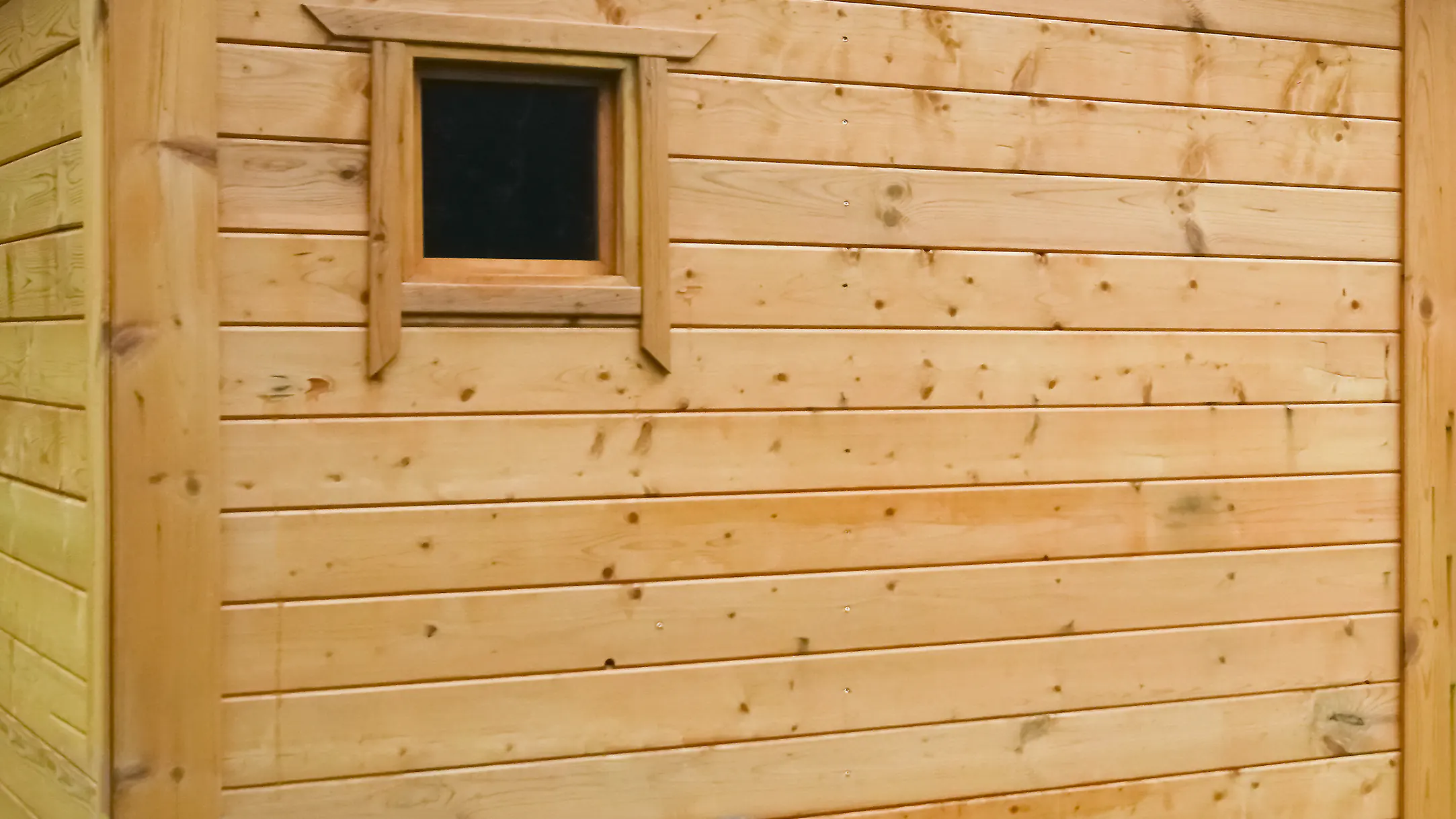 A close up of wood siding