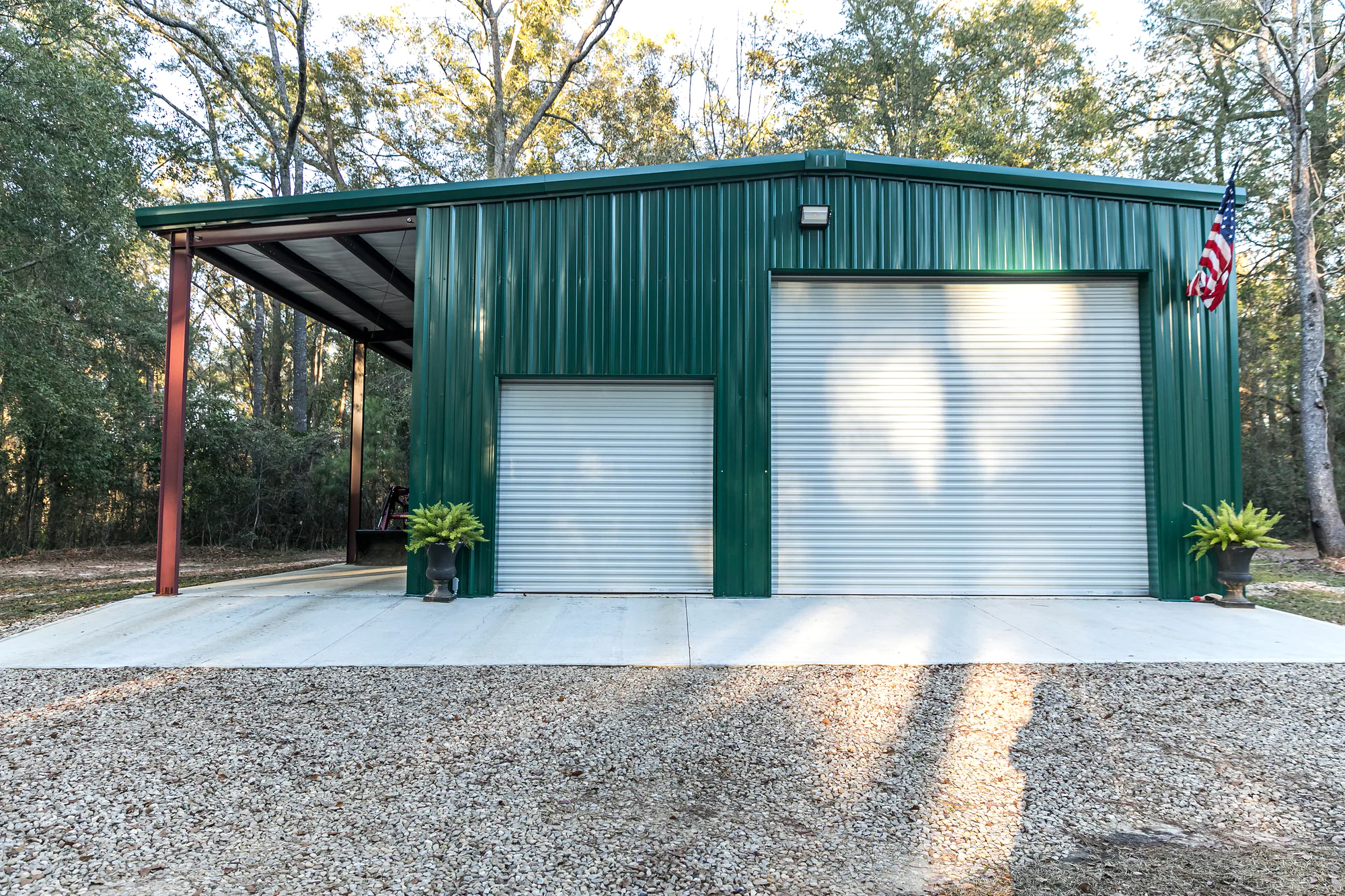 Green steel siding on detached garage