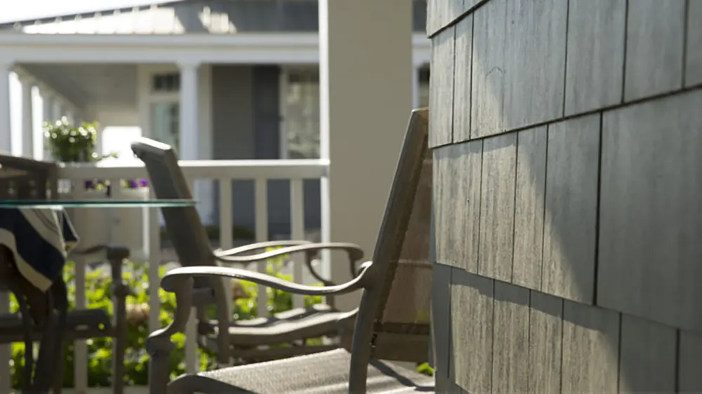 A close up of james hardie cedar shake siding